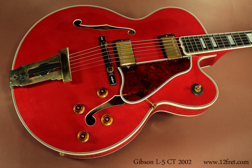 This Gibson L-5 CT from 2002 could be your best friend if you're headed to the (orchestra) pit.  It's in near perfect condition, and is just a joy to play. 

The L-5 CT is based on the L-5 CES but is a 'thinline' version, with a side with of 2.25