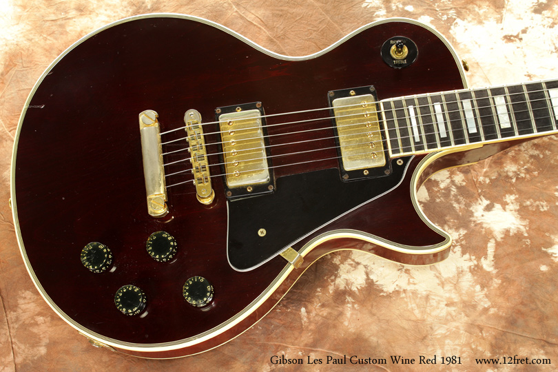 The Gibson Les Paul Custom is an iconic guitar.   It's been used in pretty much every genre, from jazz, to pop, from country to metal, from punk to fusion and points between. This 1981 Wine Red Gibson Les Paul Custom is in good condition.  It's definitely seen some playing over the years, and that's a good thing.