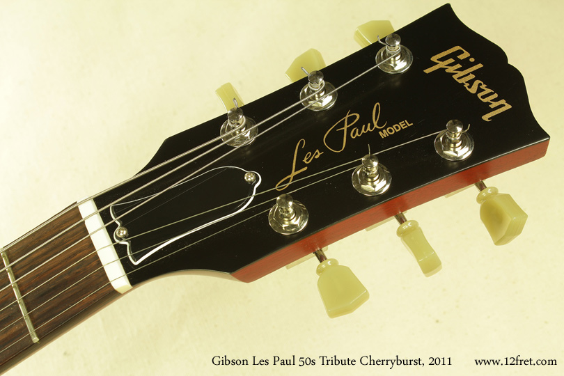 Gibson has built the Les Paul model since 1952.  This 2011 Cherryburst Gibson Les Paul 50s Tribute has all the basic, early Les Paul features - maple cap on a mahogany back, mahogany neck with rosewood fingerboard, and P-90s.