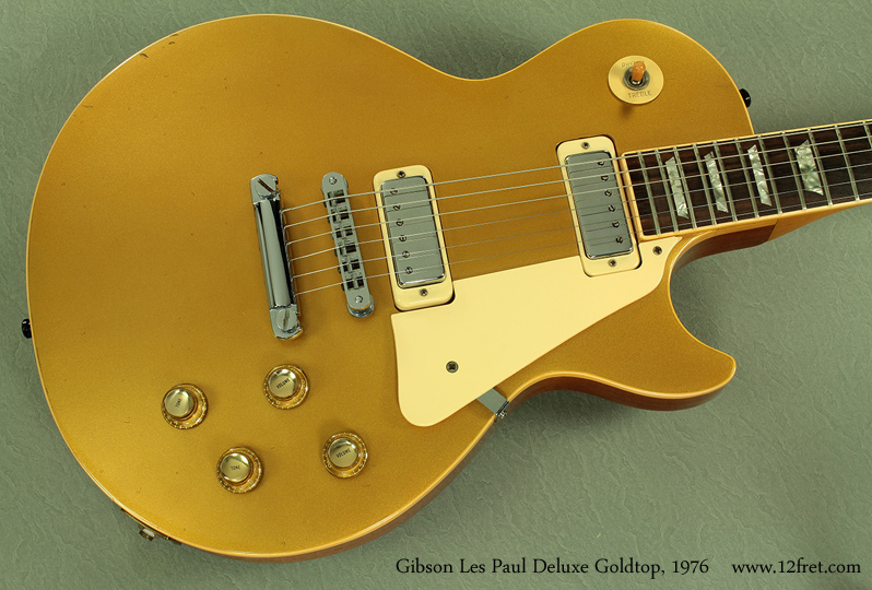 Here's a great Gibson Les Paul Deluxe Goldtop from 1976.   
The Gibson Les Paul was first released with this finish - metallic gold top and clear on the rest of the guitar. Over the years, the gold top finish has been available but by the 1970's was mostly seen on the Deluxe model, featuring two mini-humbucker pickups (from Gibson's Epiphone stock) in P-90 sized routes.