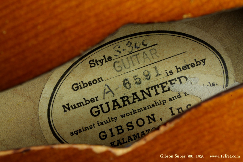 I've never actually seen one of these before - but, there were only about 200 produced, between 1948 and 1955.  This is a 1950 Gibson Super 300.  The Super 300 is very similar to its much better known older brother, the Super 400.   The key difference is the modesty of the 300's decoration - at least compared to the Super 400.