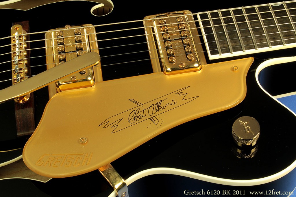 The classic Gretsch 6120 is orange, in various shades of faded.   But this 6120 looks so good with the gold hardware and white binding on black, that black just has to be the new orange.   Sold at $1699 CAD.