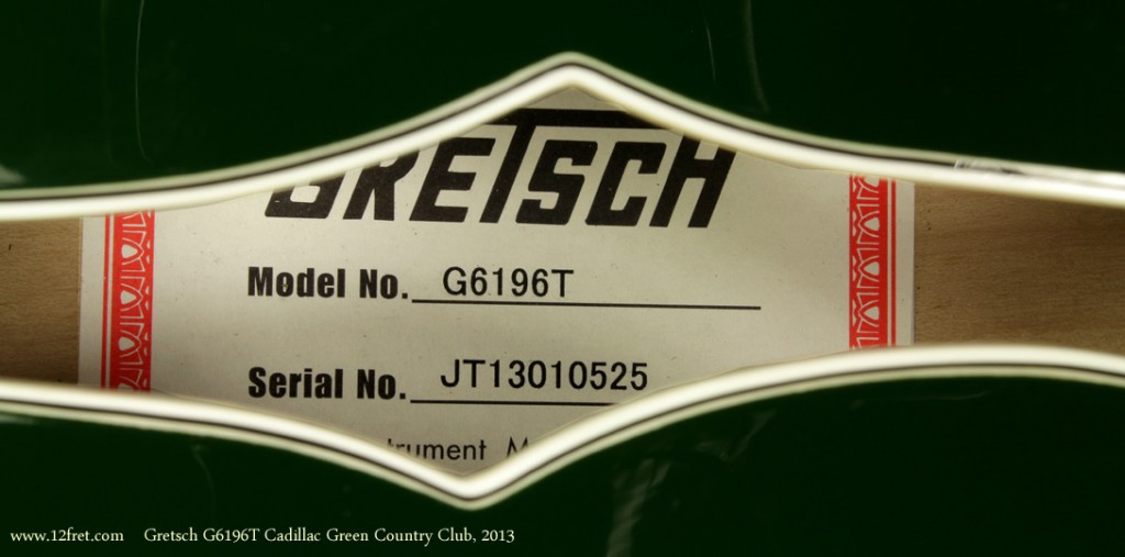 This is just great - a near-perfect, one year old Cadillac Green 2013 Gretsch G6196T Country Club.   The Gretsch G6196T Country Club can look a lot like the Gretsch White Falcon, and that's because it shares body and neck dimensions.   However, the Country Club has a solid spruce top instead of laminated maple and more -- restrained decoration.