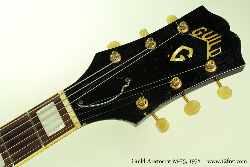 This Guild Aristocrat M-75 from 1958 is in great playable condition; it looks great, it's very comfortable, sounds fabulous, and it's quite light.  

Though we might be tempted to think that the Aristocrat was a response to the Gibson's introduction of the Les Paul, it's much more likely that it was a reaction to Gretsch's introduction of Duo-Jet guitars.