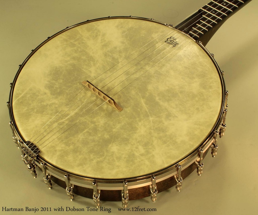 Anne Hartman builds banjos and guitars in the Toronto area and is quickly establishing herself as a respected luthier. This is a wonderful example of her work, and is built around a rare, vintage-style component - a nickel-plated brass Dobson-style tone ring (made by Rickard).