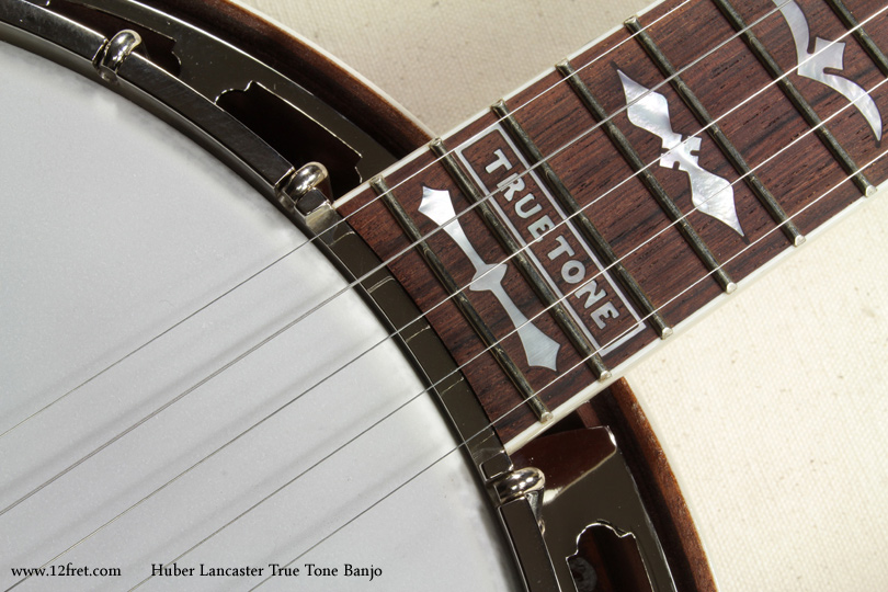 Today we're looking at a new Huber Lancaster TrueTone banjo.  This banjo is built to reflect the most prized pre-war 5-string banjos, which were generally built of mahogany with nickel plated parts.
