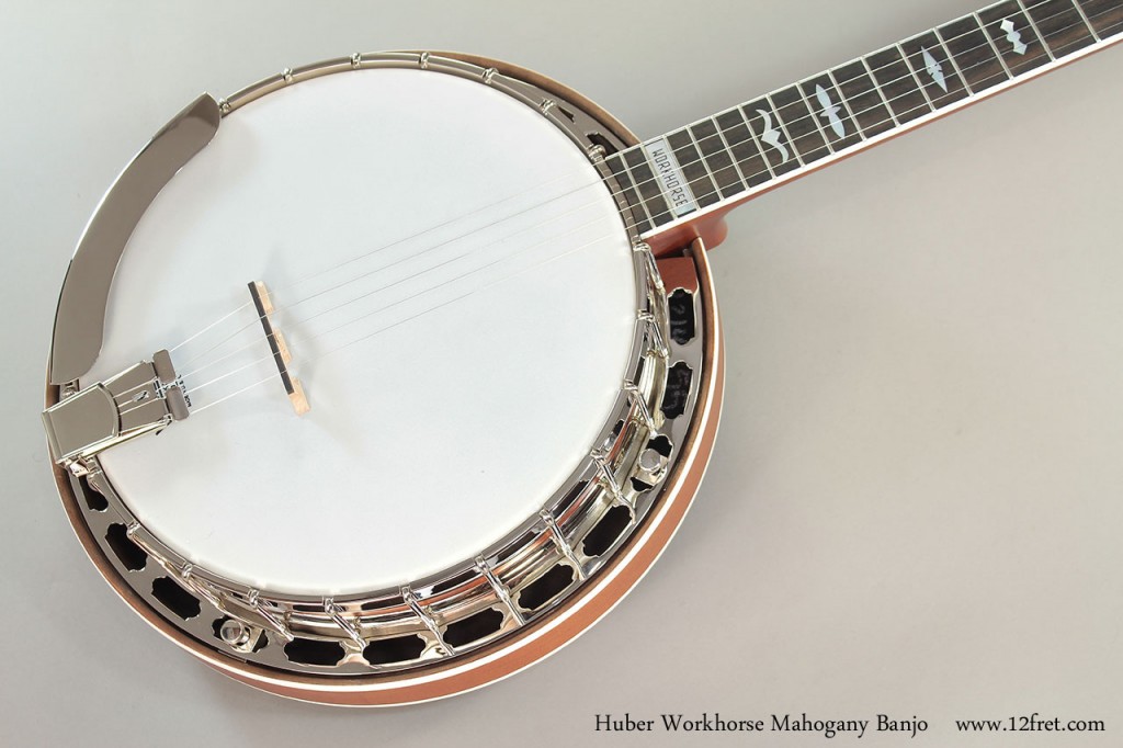 At last -  a Huber banjo that won't break the bank!  The Huber Workhorse is Huber’s new Mastertone RB-3 'clone' model, with the Huber 844 Tone Ring, Bowtie inlays, nickel hardware and Sims maple rim. The Satin finish feels like a lovely old banjo.
