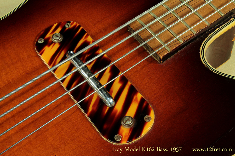 Today we're looking at a wonderful Kay Hollowbody Model K162 bass from 1957, in original condition.  Kay introduced the Model K162 Bass in 1952 in response to Leo Fender's 1951 Precision Bass, making it the second electric bass produced.  The K162 was the first hollowbody bass produced, years before Gibson used the basses in their recently-purchased Epiphone line to enter the electric bass (EB) market.    

This model became known as the 