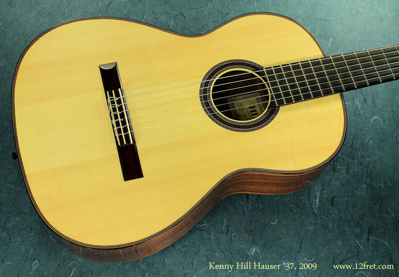 Here we  have a Kenny Hill Hauser '37 Classical, 2009 model.   This instrument has been well played and has a few marks, as French Polish finishes are prone to,  but is in excellent structural condition. 

Here's what Kenny Hill has to say about this model:
