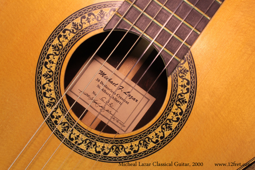 Here is a fine 2000 Michael Lazar classical guitar. 

Michael Lazar is a builder -- and ex-banker -- living and working in St. Albert, Alberta.   He discovered a passion for classical guitars and began building classical guitars around 1980.  Since retiring from banking in 2000, has focused on guitar construction.