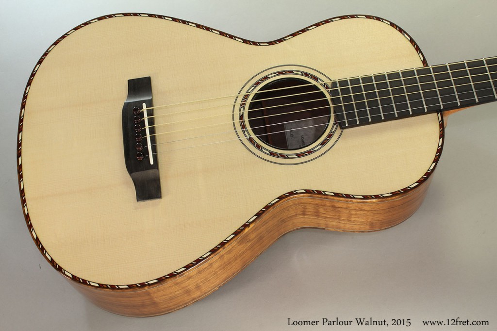 Here is a lovely  Walnut-bodied Parlour Guitar from the shop of John Loomer in Darien, Connecticut.   John has been repairing and building in Darien for quite some time.