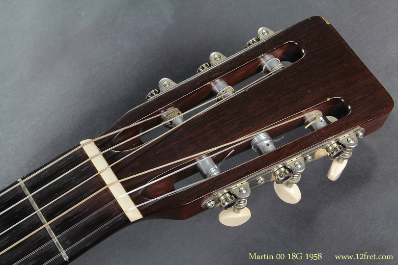 Here is a very clean Martin 00-18G, built in 1958.

In the late 1950's folk music revivals started in many countries.   In response to this, instrument companies started making more nylon string instruments, which differ from what we now call 'classical' instruments in many ways.  They are based on steel-string instruments, are intended to be strummed or plucked, and the neck is narrow enough that you can use your thumb for fretting!