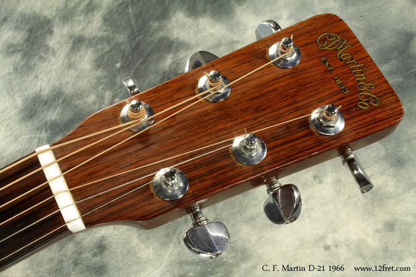 This 1966 Martin D-21 was built just before Martin stopped using Brazilian rosewood in response to Brazil's restrictions on the export of Brazilian Rosewood in lumber form.   This, then, is one of the last Brazilian D-21s. 
 
 This example of the D-21 line is in good physical shape and good playing condition, and sonds quite good.