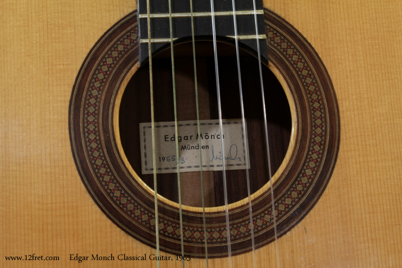 This 1965 Edgar Monch Classical Guitar is from just before his Toronto period, one of the last from Munich.  It has a clear, commanding voice with a full, rich tone and is suitable for the hands of an advanced or professional guitarist.  It has a clear, commanding voice with a full, rich tone.  It's had some top cracks repaired, and is structurally in good condition.  Of a similar design to Hauser guitars of the period, It features a spruce top, Indian rosewood back and sides and bridge, an ebony fingerboard with 650mm scale length and 50mm nut width.