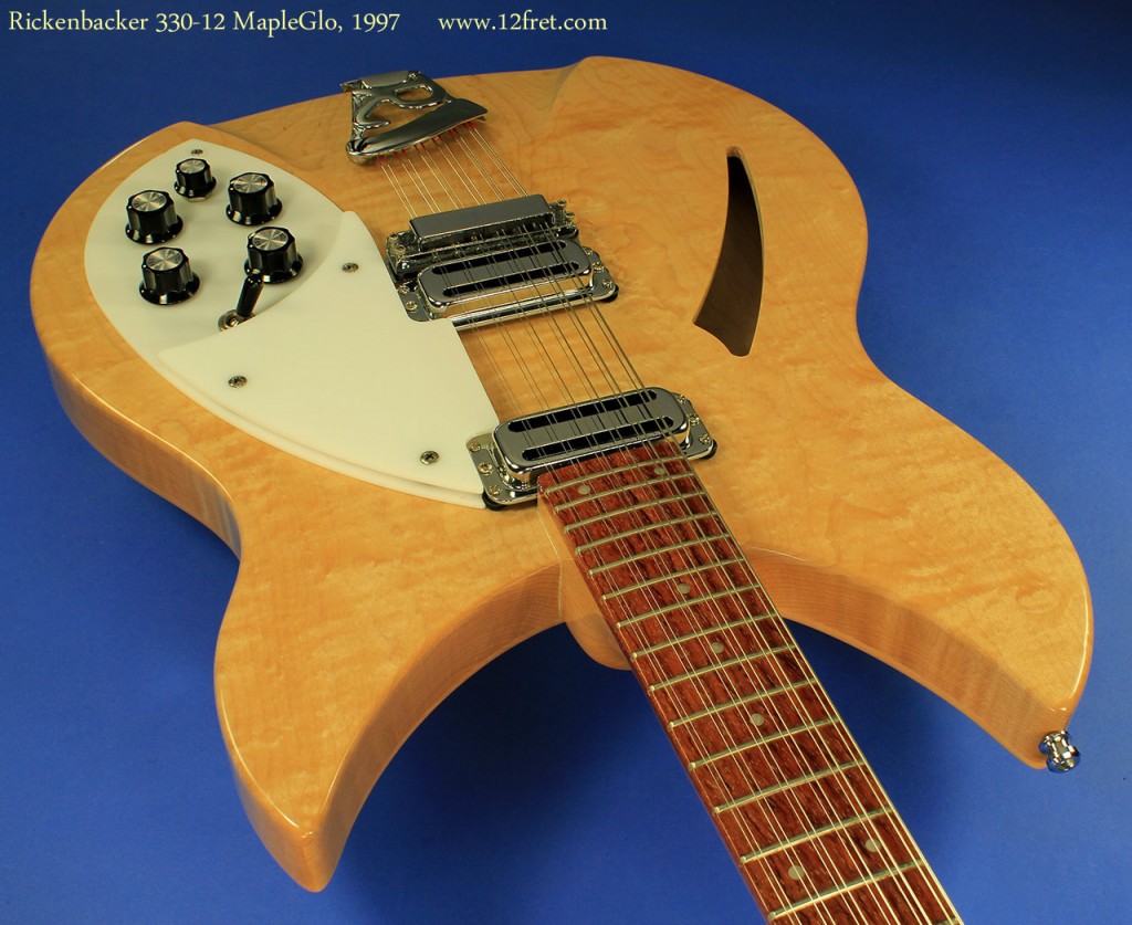 Rickenbacker builds some of the most attractive and 'non standard' shape guitars around.   The 330 shape is one of my favourite - swooping cutaways and yet tasteful dramatic lines.   This beautiful example is in near-perfect condition.
