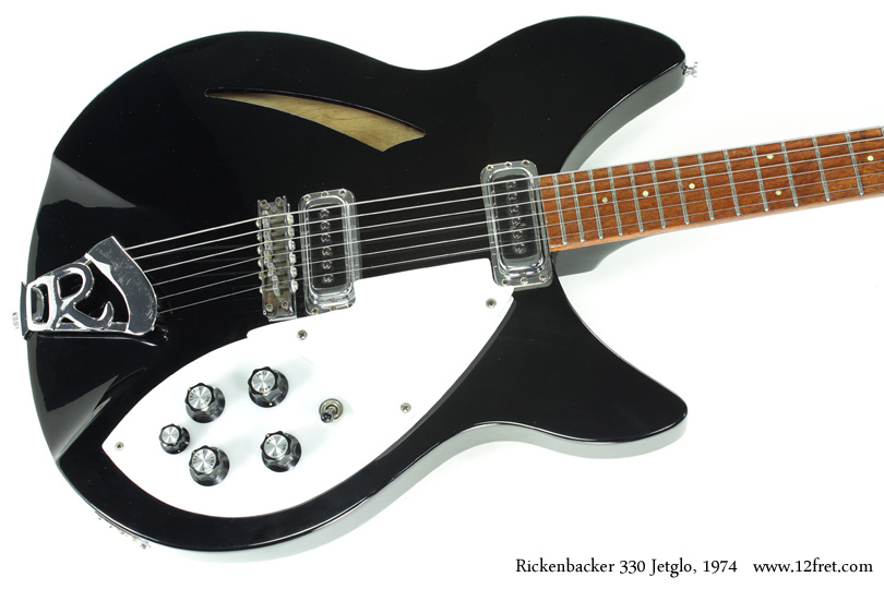 This 1974 Rickenbacker 330 Jetglo is in very good condition - though it has been played and has some fretwear, it has very few marks or wear otherwise.