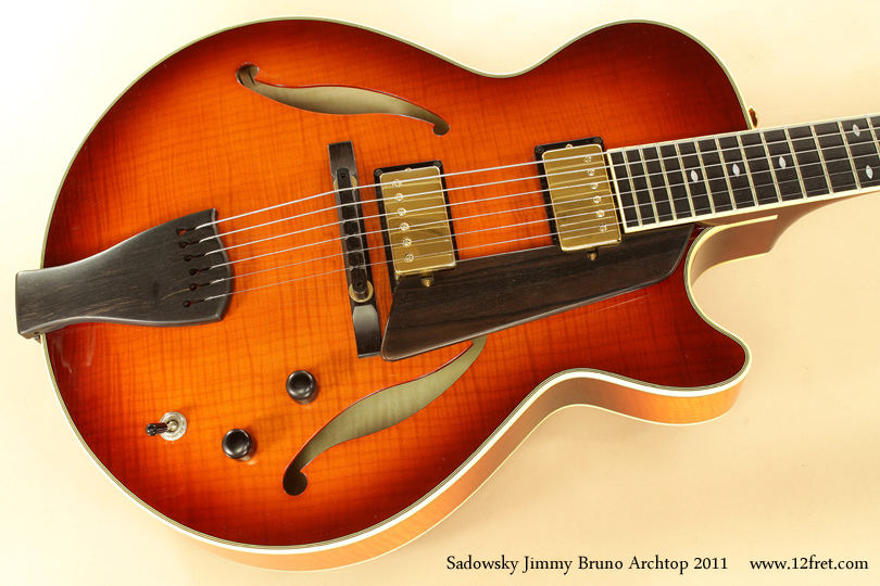 Here is a lovely 2011 Sadowsky Jimmy Bruno Archtop.  It's in great condition with one small chip at the end of the headstock, plays very well and has a wonderful smooth sound.