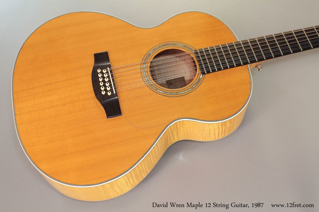 This 1987 David Wren Maple 12 String Guitar draws some visual influences from the classic Guild jumbo 12's, though the modified body shape produces a tigher, more focused and less boomy sound while retaining much of the raw power of the Guild.   This was David's largest model, and he referred to it as the 'Roundup'.