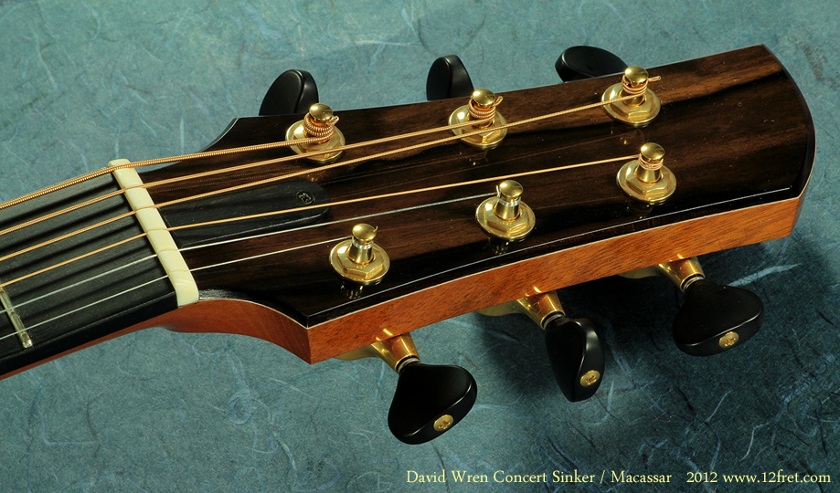 Here's a very lightly used Concert style guitar from David Wren, built during 2012, and featuring a 'Sinker' redwood top and Macassar ebony back and sides.