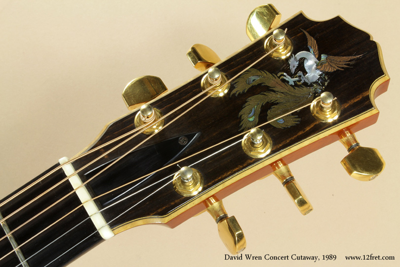 This 1989 David Wren Cutaway Acoustic is in great visual and playing condition, with a lovely peacock inlay on the headstock.